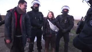 Leaked video shows Greta smiling next to police, was it all staged?