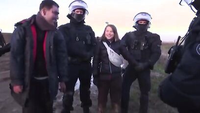 Leaked video shows Greta smiling next to police, was it all staged?