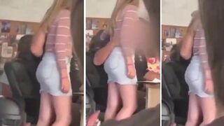 Teacher caught touching female student, seems quite inappropriate
