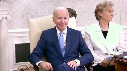 Biden sits quietly, looks confused as reporters ask questions