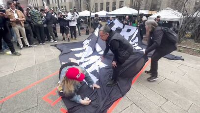 Trump supporter stands up for former president, scuffle breaks out in NYC