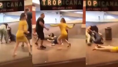 Guy slaps this woman who tried jumping his wife at Tropicana in AC
