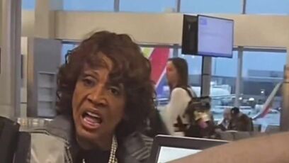 Maxine Waters appears confused at the airport