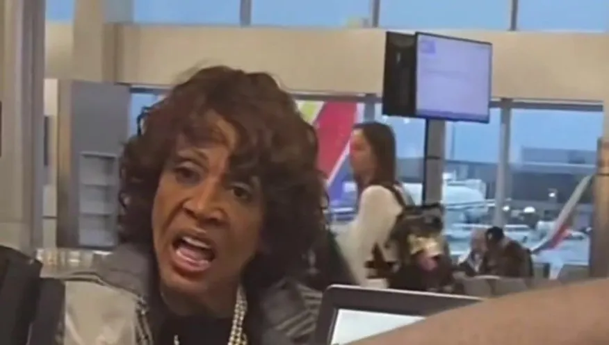 Maxine Waters appears confused at the airport