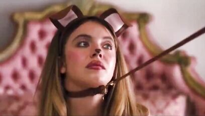 Sydney Sweeney doing puppy play in a leash