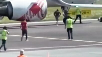 WTF??? 35-year-old Andrea Russo jumps into jet engine