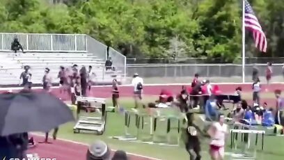 High school runner gets smacked from behind mid-race