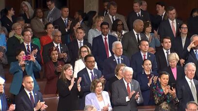 The "NO KINGS" crowd greets King Charles with a standing ovation