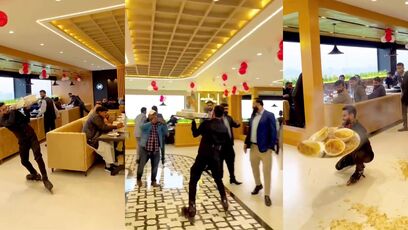 Indian dude tries serving food on roller skates