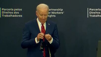 Unfit for office? Video shows Joe Biden struggle to use ear piece