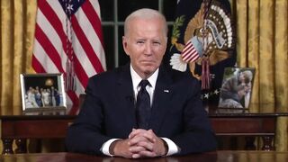 Biden sits in silence, looks like he doesn't know he's already live on the air