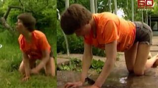 Woman raised by  feral dogs, found walking on all fours and barking