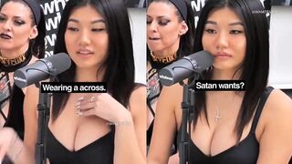 Woman wearing Holy Cross gets confronted about her job