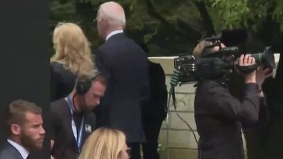 Jill walks away with Joe Biden during D-Day ceremony