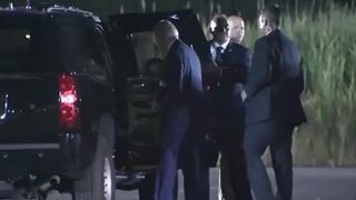 Joe Biden getting into a car