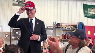 Video of Joe Biden putting on a Trump hat shows full context