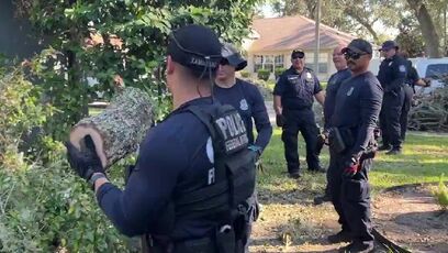 Here's CBP using like a dozen people to move a tiny log