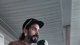 Watching neighbor tear down Harris/Walz signs