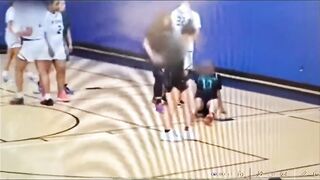 Giant male injures 3 girls during basketball game, coach throws in the towel