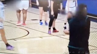 Giant male injures 3 girls during basketball game, coach throws in the towel