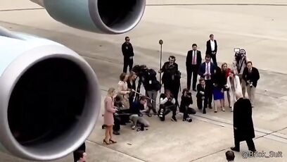 Which reporter hit Trump in the face?