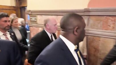 Tom Homan waves to protesters invading the NY State Capitol