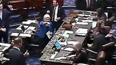 Pochontas, aka Elizabeth Warren, holds a BIG THUMBS DOWN to keeping males out of girls sports