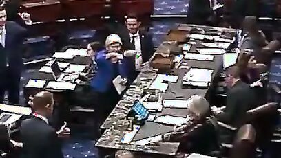 Pochontas, aka Elizabeth Warren, holds a BIG THUMBS DOWN to keeping males out of girls sports