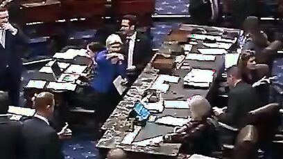 Pochontas, aka Elizabeth Warren, holds a BIG THUMBS DOWN to keeping males out of girls sports