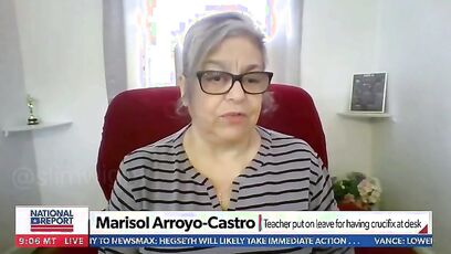 Teacher suspended for refusing to remove crucifix files lawsuit