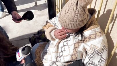 'Fake News' Media shows migrant woman crying when CBP One app goes down