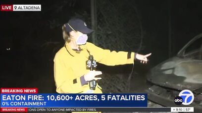 Reporter shows car where metal has melted along the ground