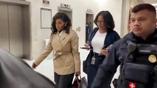 Security stands between Jasmine Crockett and reporter asking tough questions