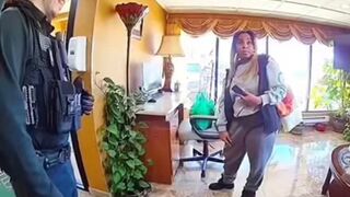 Woman refuses to leave when confronted by police