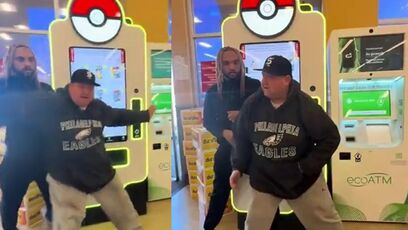 Two grown men fight over Pokémon cards