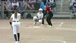 Male softball pitcher dominates female players