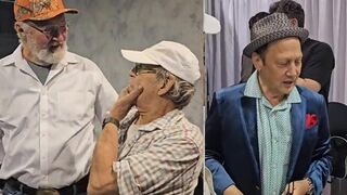 Randy Quaid and Chevy Chase greet each other at the Fan Expo in Chicago