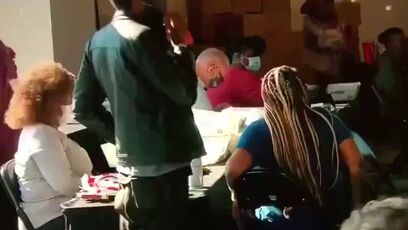 2020 video shows Georgia poll workers passing USB drive suspiciously