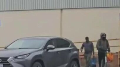 They pulled up in an expensive Lexus NX to take items from the food bank
