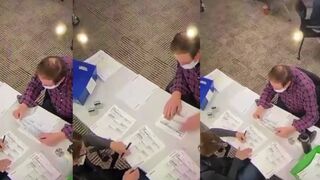 Footage of poll workers allegedly filling out ballots during 2020 election