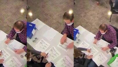 Footage of poll workers allegedly filling out ballots during 2020 election