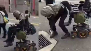 Wheelchair bound ICE protester seems to have a divine intervention