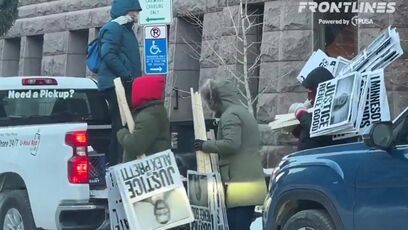 Protesters Show Up With TRUCK LOAD of signs, oh yeah, that's totally organic