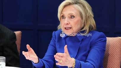 Hillary went all out in her BLUE DRESS